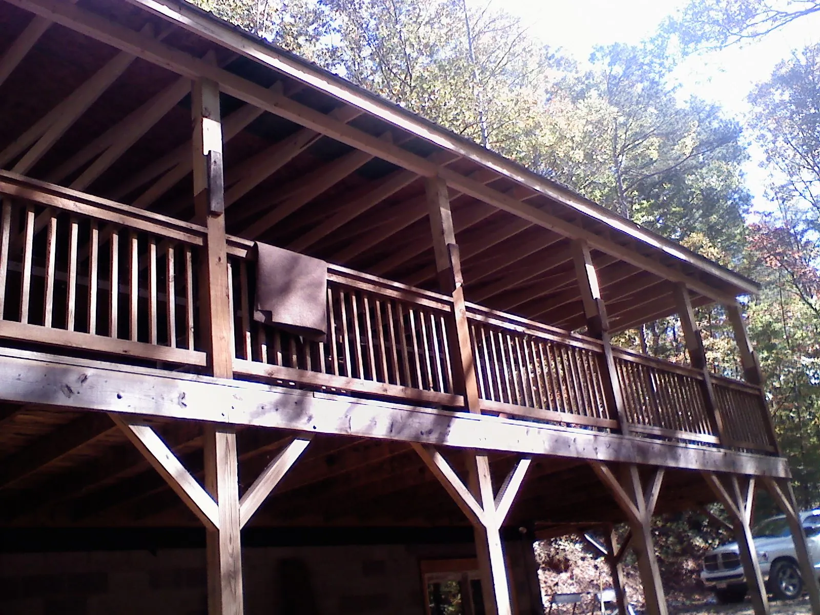 Timber framing under a new elevated porch and deck — Roof Leak Repair in Leicester by Roofing Brothers